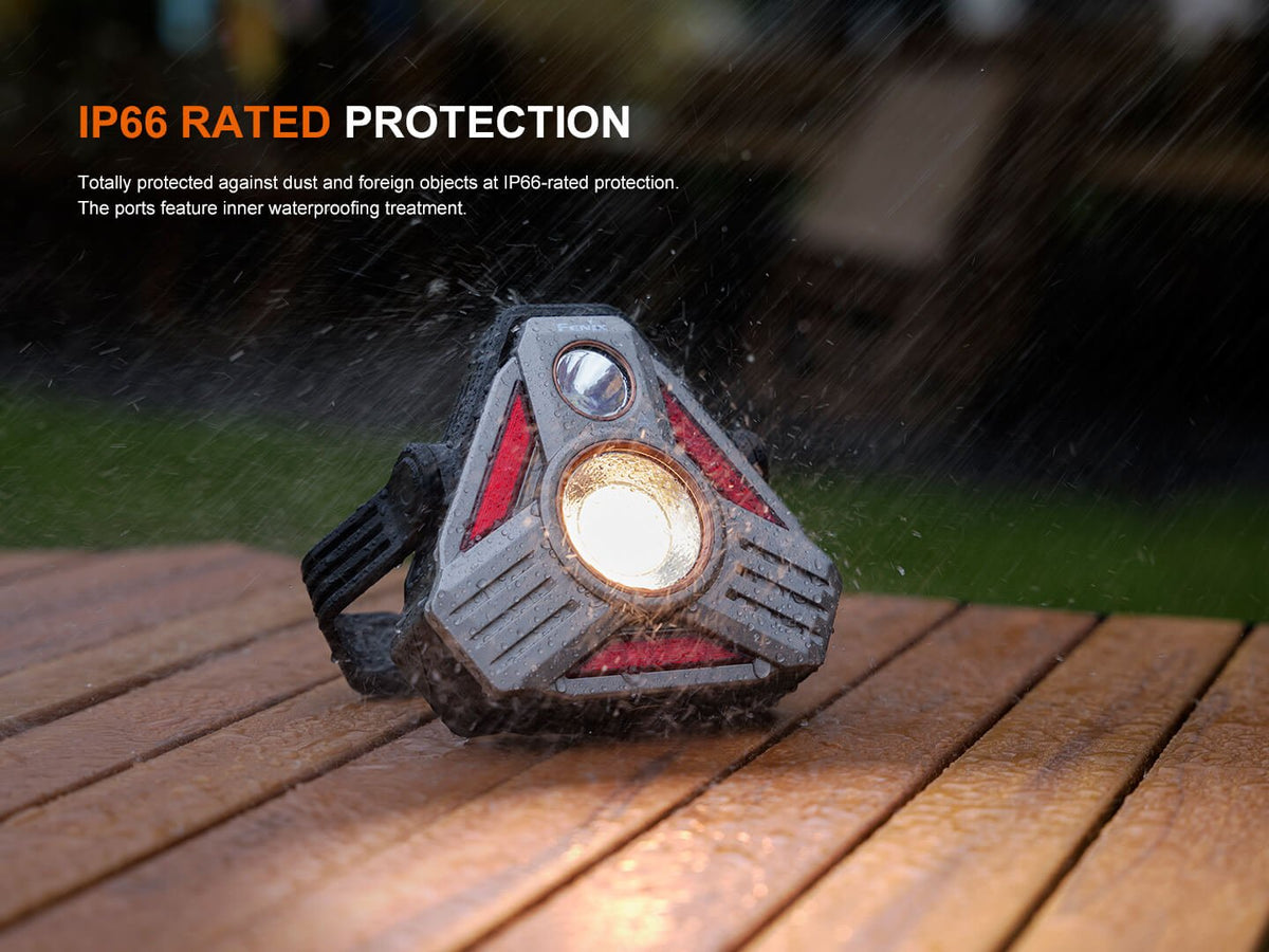 Fenix CP50R Road Hazard Lantern, rugged gray with orange accents, IP66 protection, on rainy deck on Tampa Home & Garden Store