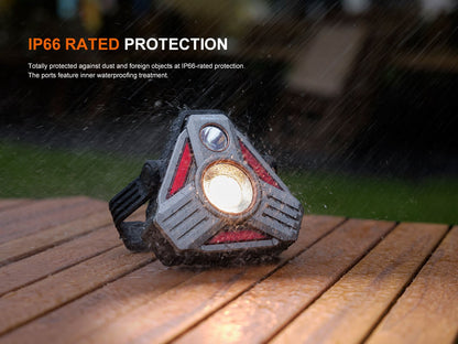 Fenix CP50R Road Hazard Lantern, rugged gray with orange accents, IP66 protection, on rainy deck on Tampa Home & Garden Store