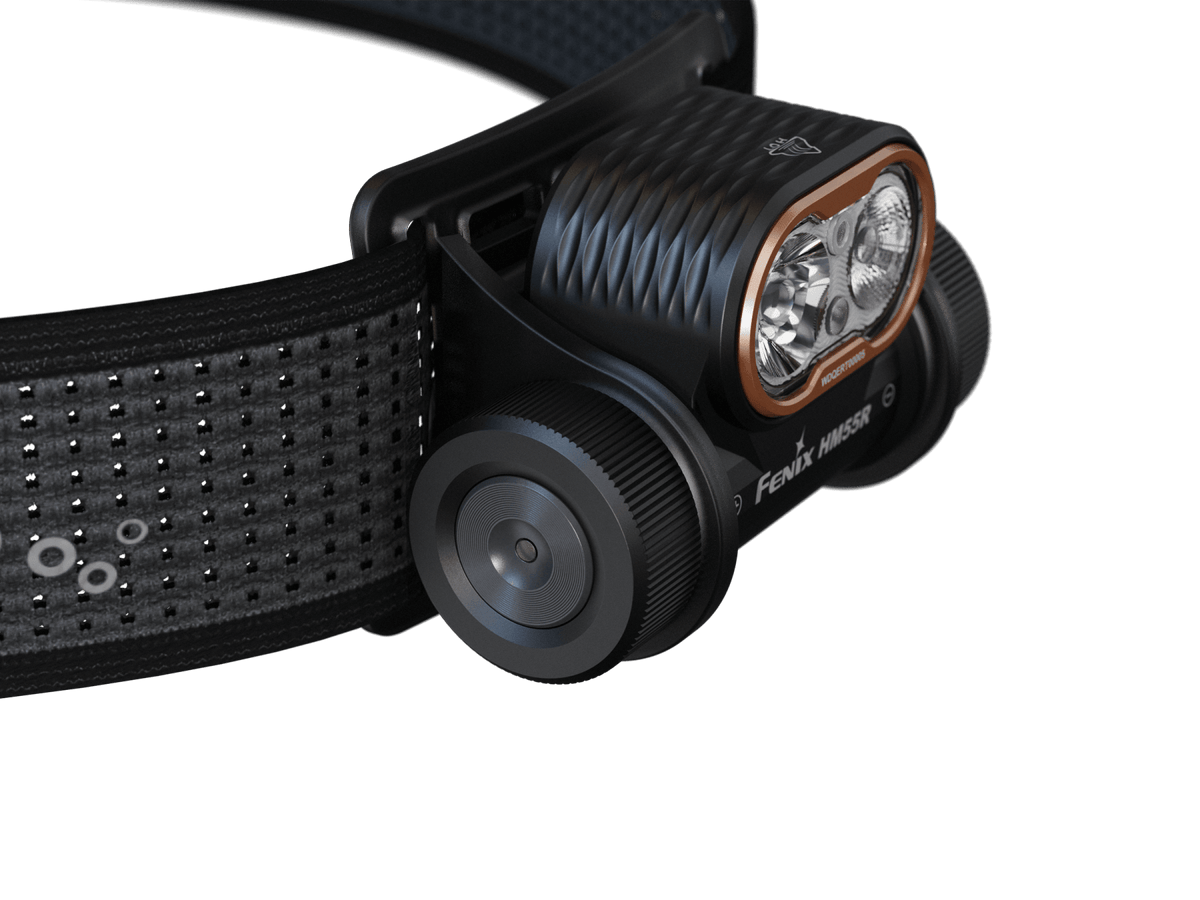 Fenix HM55R multi-LED headlamp with orange bezel and perforated black strap on Tampa Home & Garden Store
