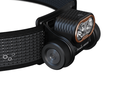 Fenix HM55R multi-LED headlamp with orange bezel and perforated black strap on Tampa Home & Garden Store