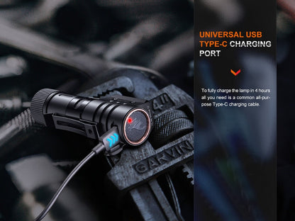 Fenix HM71R headlamp, rechargeable LED, black body with orange ring, USB-C charging cable on Tampa Home & Garden Store