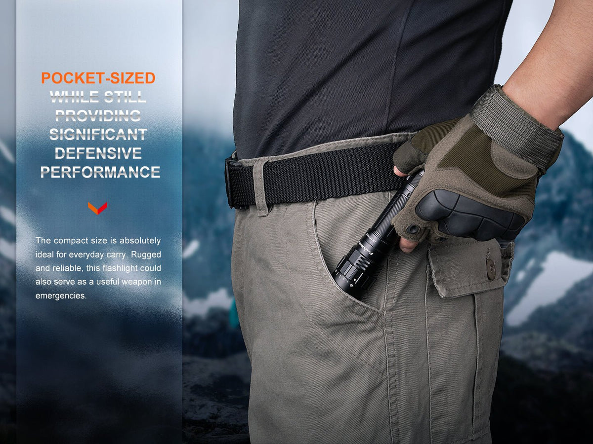 Fenix PD40R V3 Rechargeable Tactical Flashlight black pocket light with gloved hand on Tampa Home & Garden Store