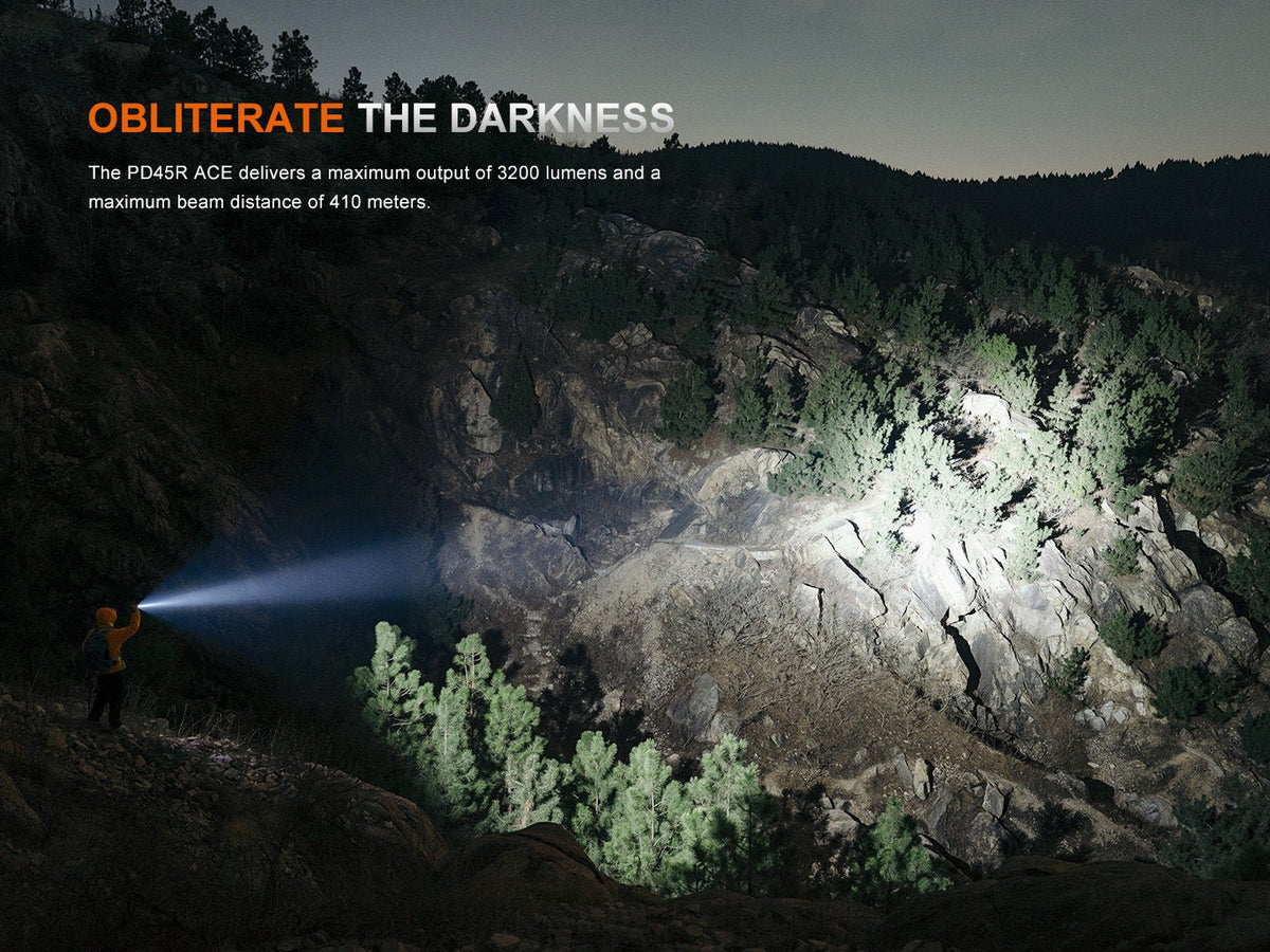 Fenix PD45R ACE Multi-Mode Tactical Flashlight in use by orange-clad hiker; beam lights canyon on Tampa Home & Garden Store