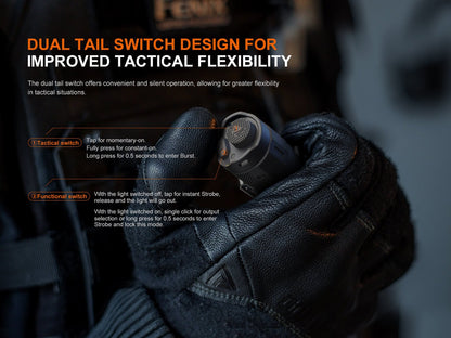 Fenix Store TK17 dual-switch tactical flashlight held in gloved hand, black aluminum handheld torch on Tampa Home & Garden Store