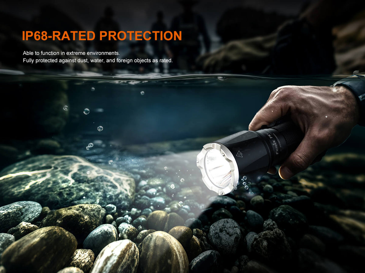 Fenix TK17 Dual Switch Tactical Flashlight, black aluminum handheld torch with silver bezel on Tampa Home & Garden Store