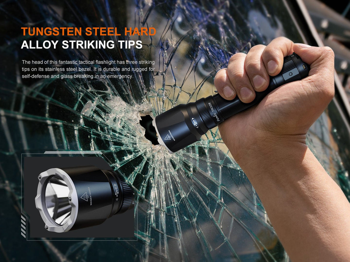 Fenix TK22R black rechargeable tactical flashlight gripped by hand against shattered glass on Tampa Home & Garden Store