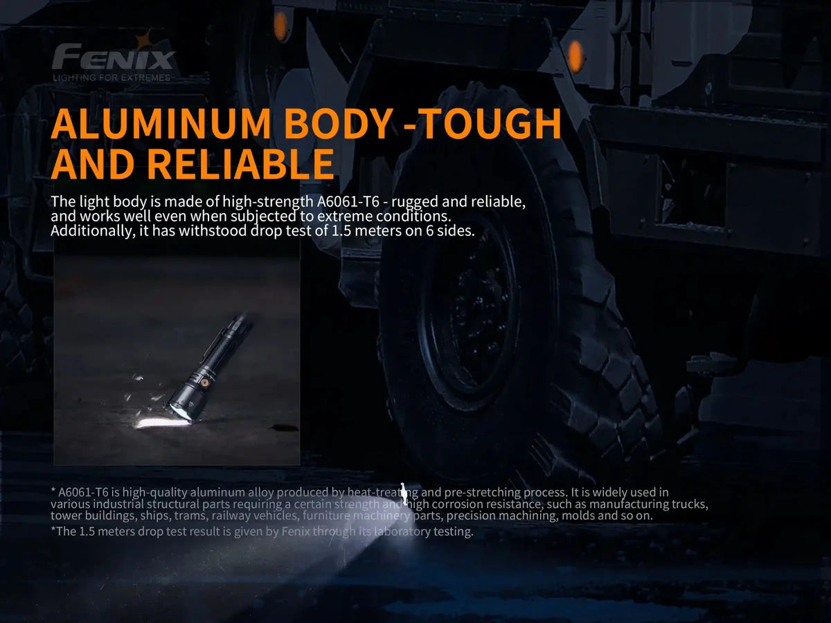 Fenix TK26R Tactical LED Flashlight black aluminum body 1500 lumens shown on rugged ground on Tampa Home & Garden Store