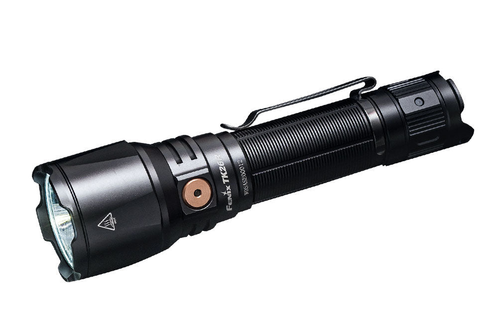 Fenix TK26R tactical flashlight, black aluminum body with copper button and pocket clip, on Tampa Home & Garden Store