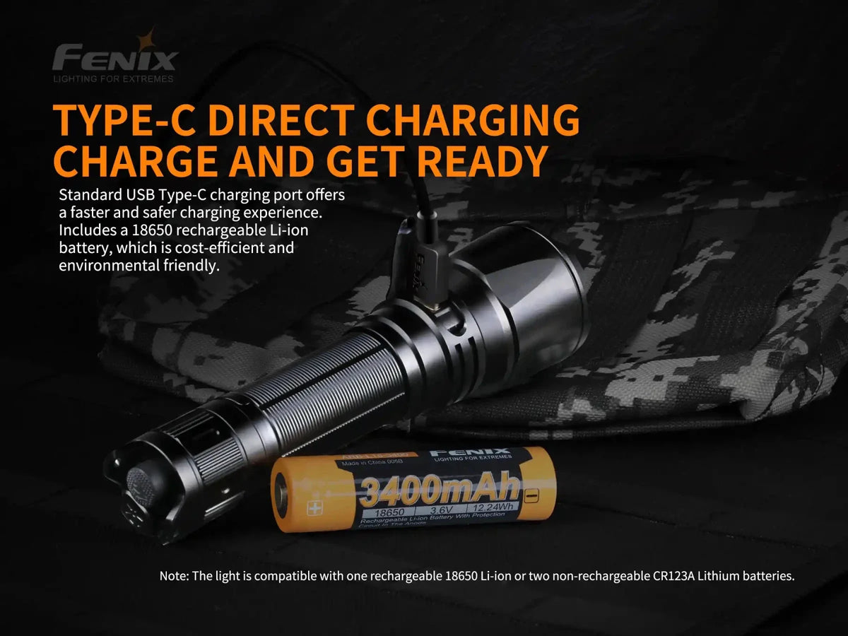 Fenix TK26R Tactical Flashlight with black anodized body and orange 18650 battery on Tampa Home & Garden Store