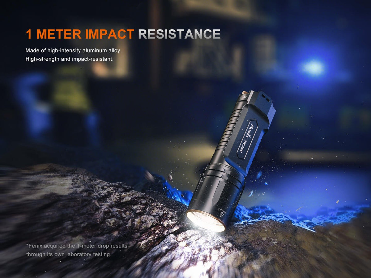 Fenix TK35R rechargeable tactical flashlight blue-black aluminum body on rugged rocks on Tampa Home & Garden Store