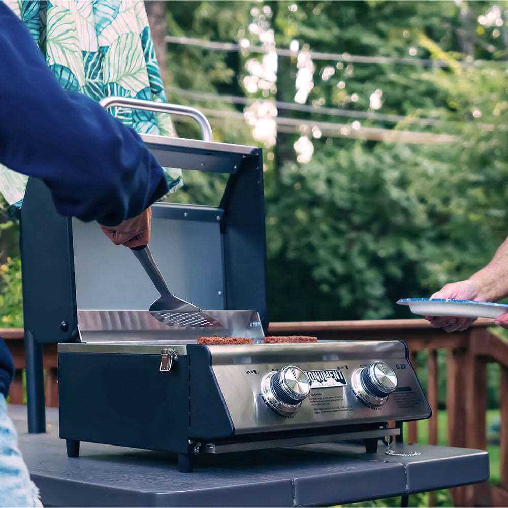 G22 Stainless Tabletop Propane Gas Grill by Monument Grills; blue steel finish with dual knobs on Tampa Home & Garden Store