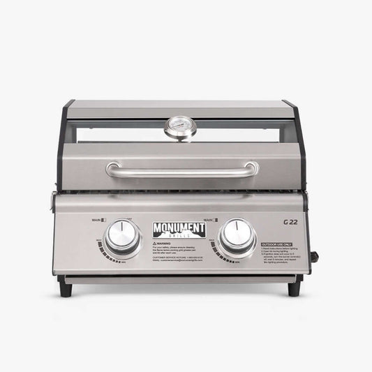 Monument Grills G22 stainless tabletop propane grill with two knobs and lid thermometer on Tampa Home & Garden Store