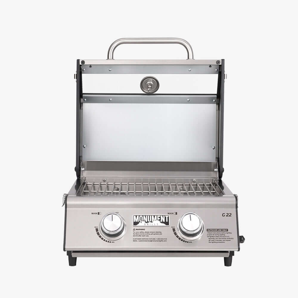 G22 stainless tabletop propane grill by Monument Grills with dual control knobs and lid handle on Tampa Home & Garden Store
