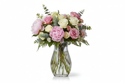 Wavy Glass Vase by Thenestedfig with clear curved silhouette and pink/white rose bouquet on Tampa Home & Garden Store