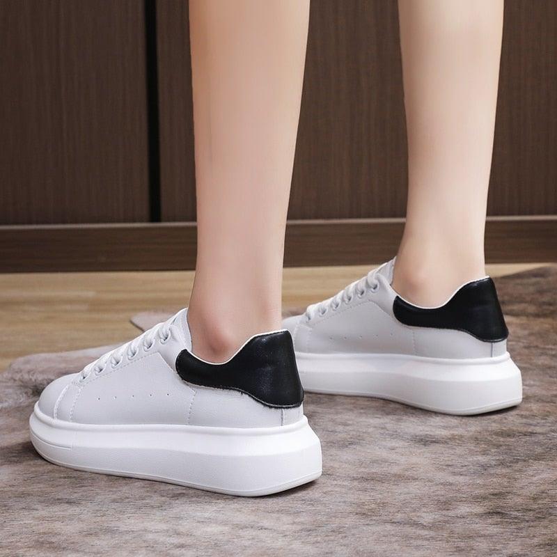 Stevvex pair of women's genuine leather platform sneakers, white with black heel patch, lace-up on Tampa Home & Garden Store