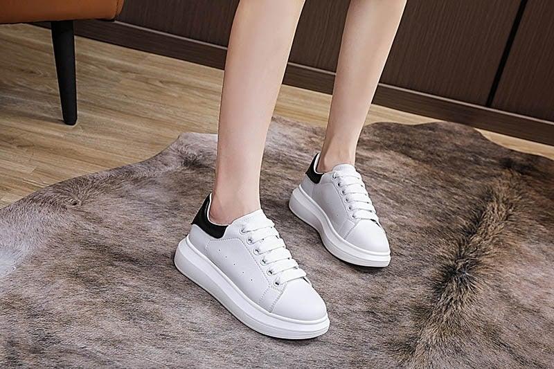 Genuine leather women platform sneakers by Stevvex, white lace-up pair with black heel collar on Tampa Home & Garden Store