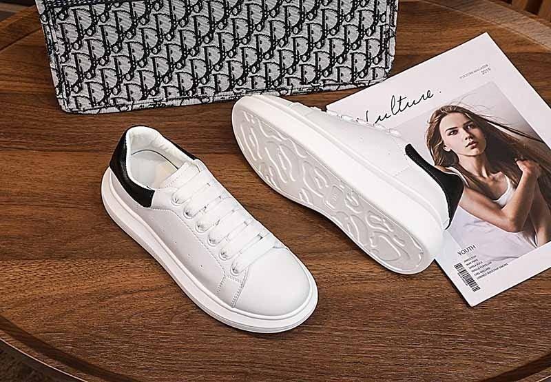 White leather women platform sneakers Stevvex, lace-up pair with black heel accent and sole on Tampa Home & Garden Store