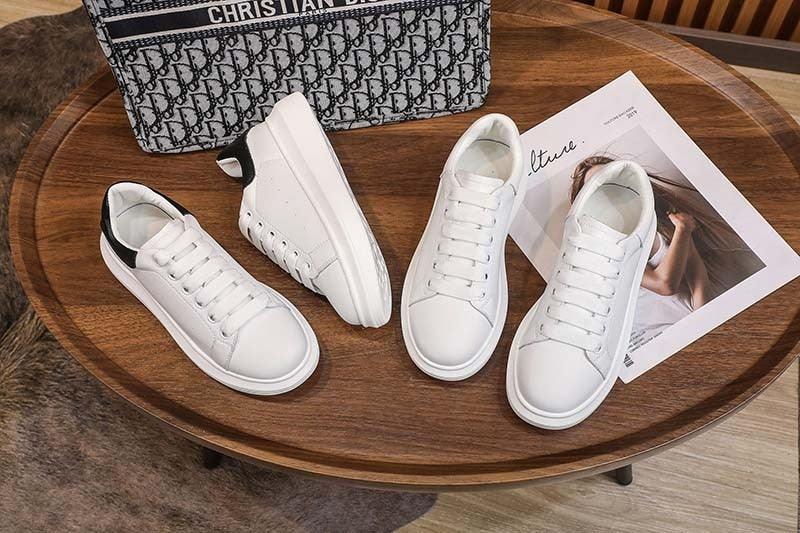 Stevvex genuine leather white platform sneakers for women, lace-up, 4 sneakers on a wooden table on Tampa Home & Garden Store
