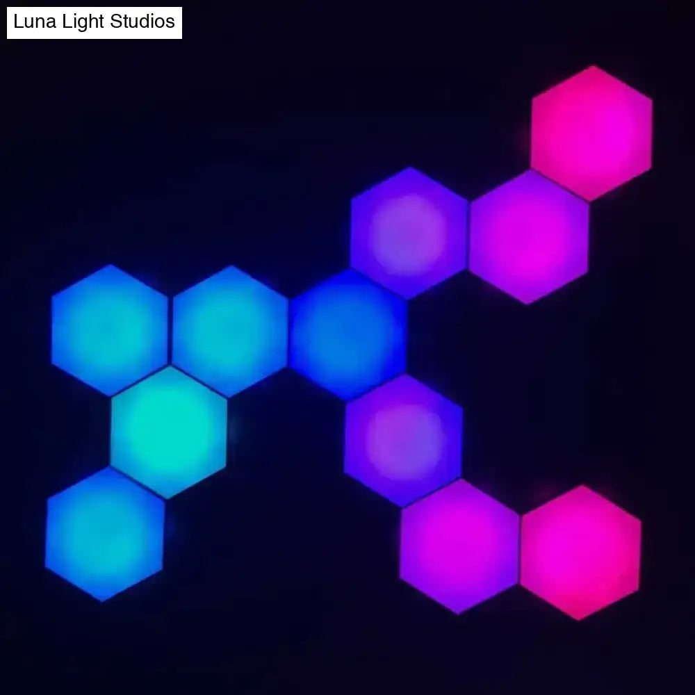 Geometric hexagon LED wall lamp with multicolor blue, cyan and magenta panels on Tampa Home & Garden Store