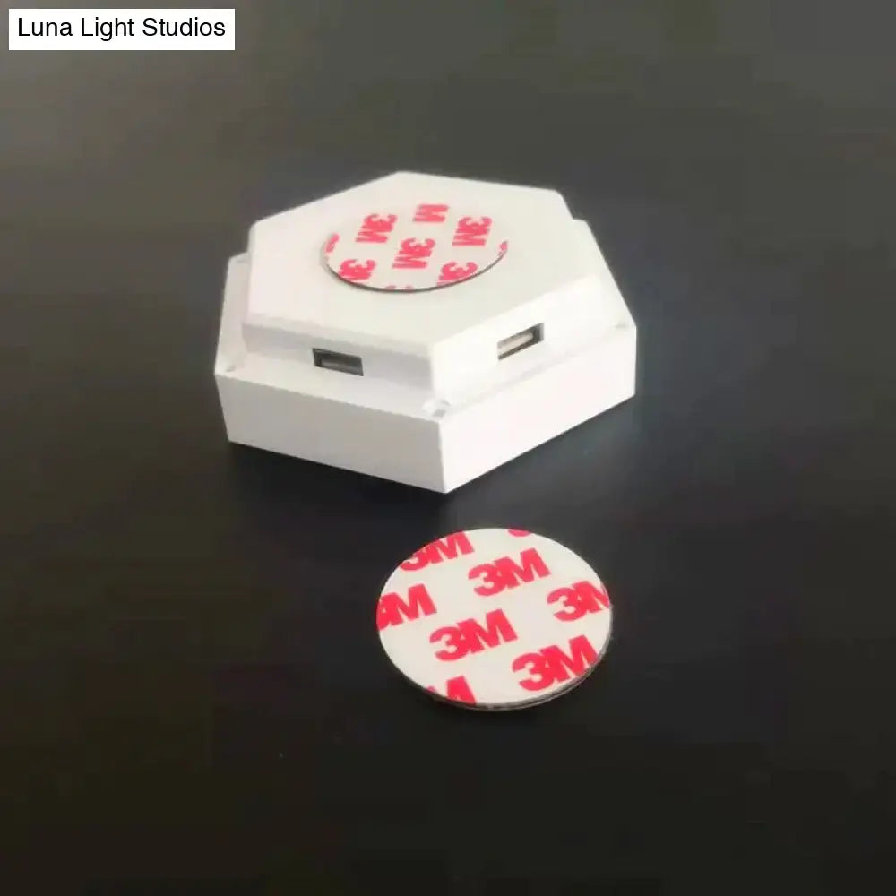 Hexagon LED wall lamp in white by Decorbites with Bluetooth app control and 3M adhesive pad on Tampa Home & Garden Store
