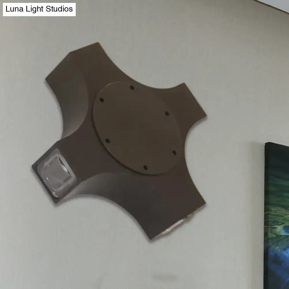 Bronze geometric wall sconce with a circular backplate and curved arms, glass end Decorbites on Tampa Home & Garden Store