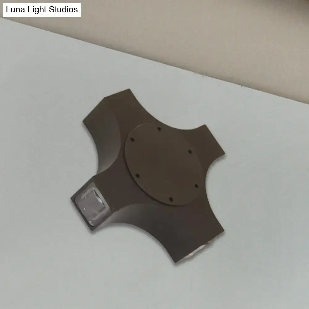 Bronze geometric wall sconce by Decorbites, back view with circular mounting plate and arms on Tampa Home & Garden Store