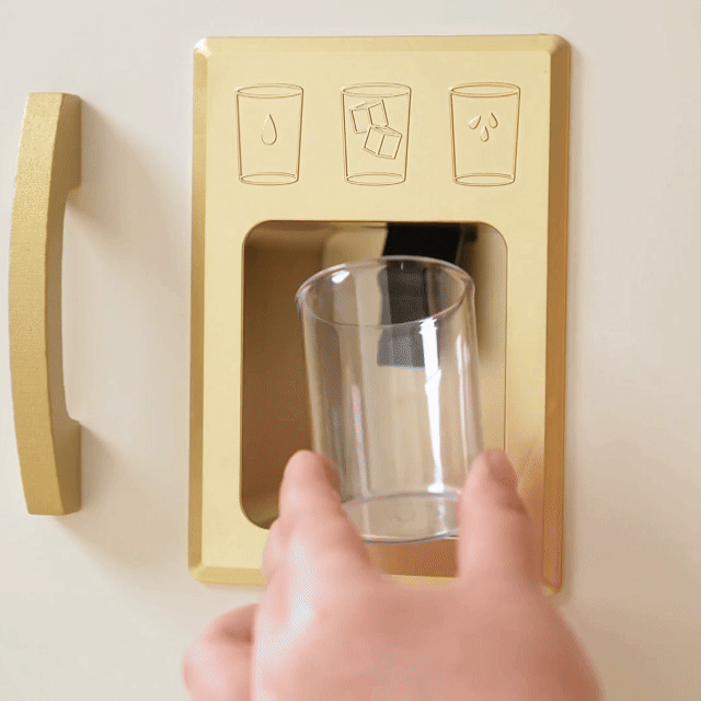 Tiny Land PopJoy Play Kitchen gold toy kitchen with a clear cup in the opening; icons above on Tampa Home & Garden Store