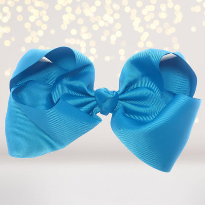 Girls 8 Inch Wide Basic Hair Bow on Alligator Clip in bright blue grosgrain on Tampa Home & Garden Store