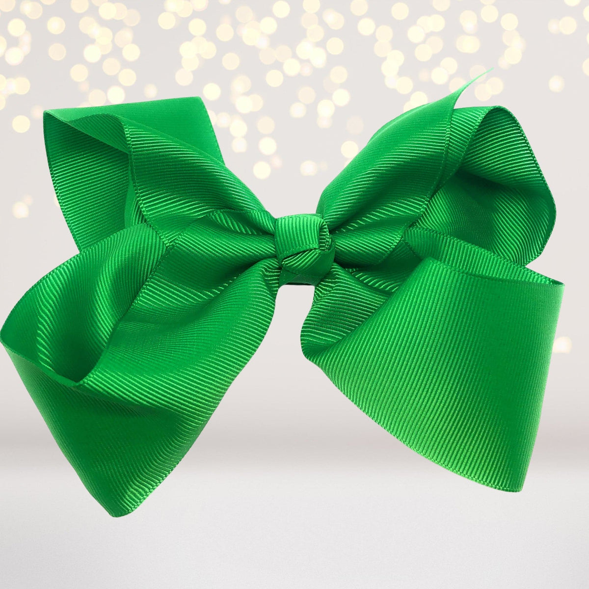 Girls 8 inch wide basic hair bow on alligator clip bright green satin ribbon on Tampa Home & Garden Store
