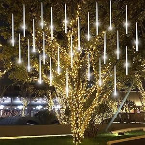 Meteor Lighting 480 LED 10-Piece Set Cool White icicle-style tree lights around a lit tree on Tampa Home & Garden Store