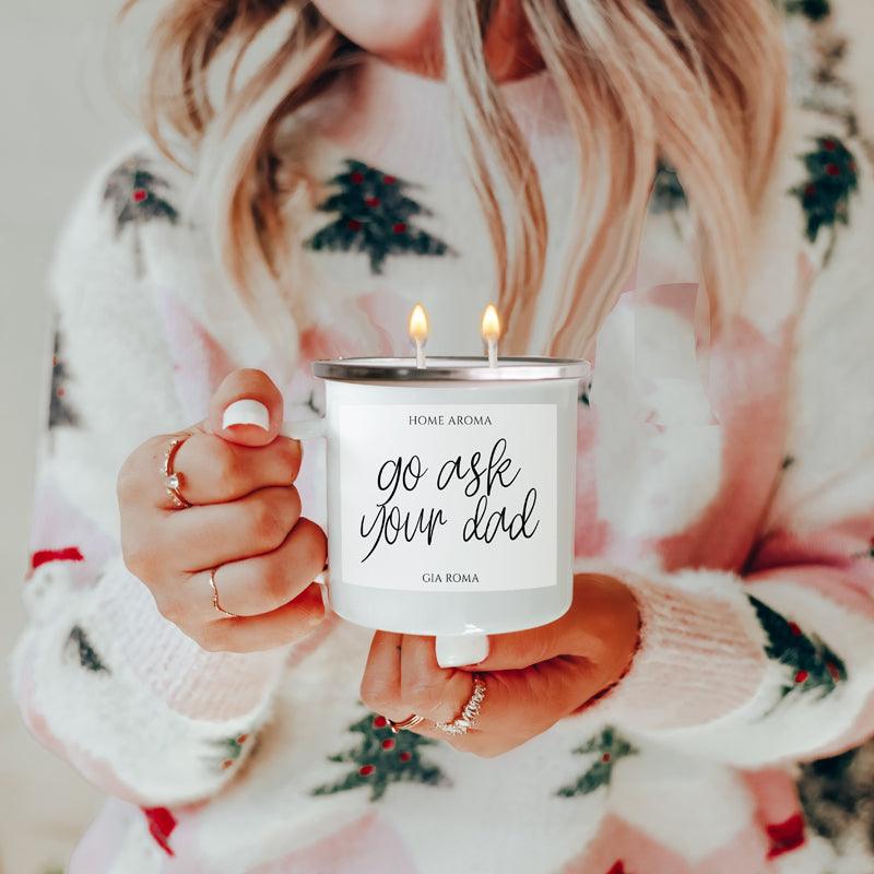 16oz candle mug Gia Roma white tin with double wick label go ask your dad held by hands on Tampa Home & Garden Store