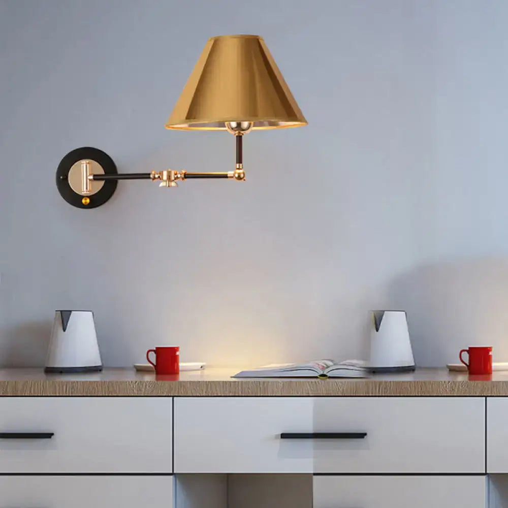Decorbites gold black cone wall sconce with brass shade on round black backplate on Tampa Home & Garden Store