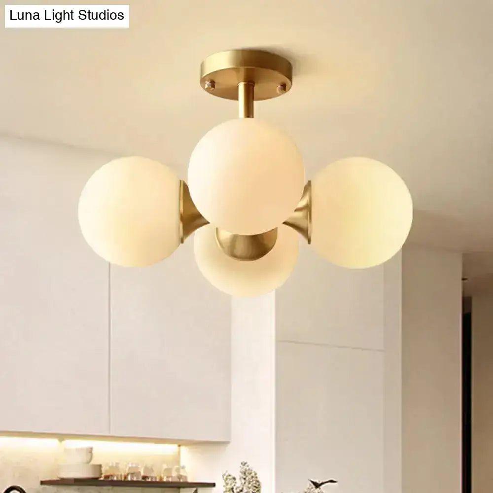 Gold Opaline Ceiling Fixture by Decorbites, brass finish with frosted glass globes on Tampa Home & Garden Store