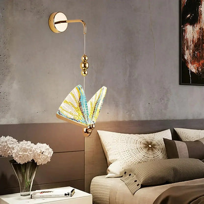 Decorbites Gold Butterfly LED Wall Light with butterfly shade mounted on wall for modern decor on Tampa Home & Garden Store