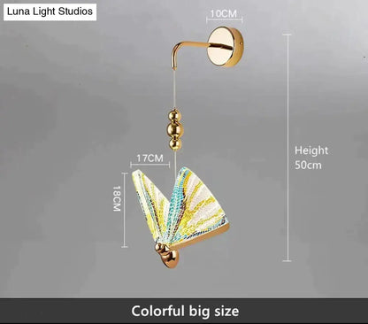 Gold butterfly LED wall light; gold wall mount with butterfly shade and hanging beads on Tampa Home & Garden Store
