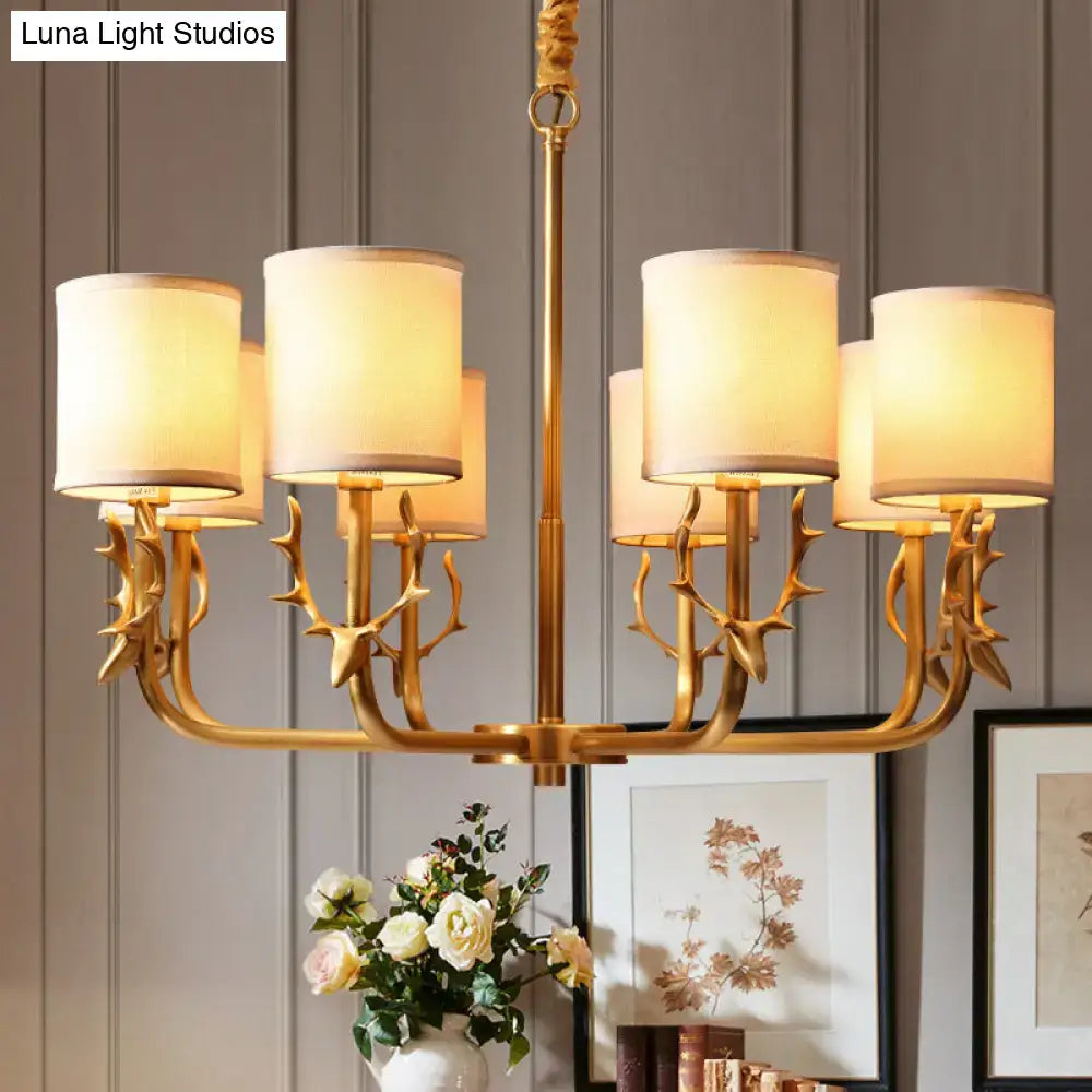 Six-light gold antler fabric chandelier by Decorbites with cream fabric lampshades on Tampa Home & Garden Store