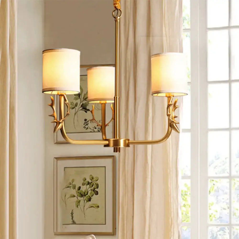 Gold Antler Fabric Chandelier with 4 cream lampshades in a gold metal frame by Decorbites on Tampa Home & Garden Store