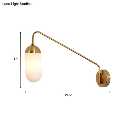 Brass wall sconce by Decorbites with curved arm and frosted glass shade, 12 in tall on Tampa Home & Garden Store