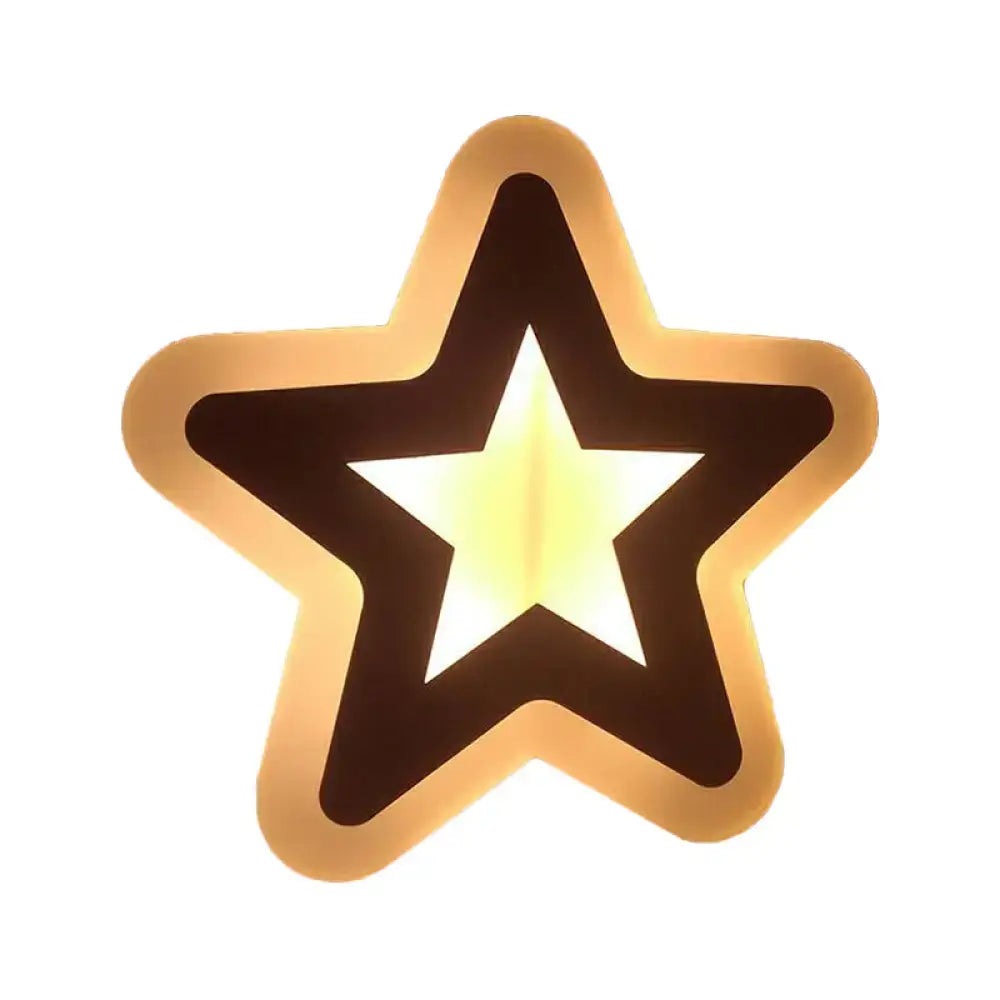 Gold star-shaped LED sconce by Decorbites, warm ambient wall light on Tampa Home & Garden Store