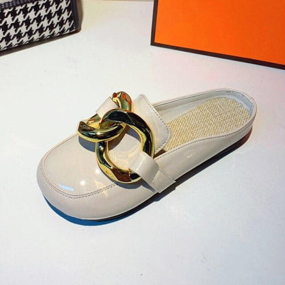 Stevvex white closed-toe slip-on mule with shiny gold chain across the vamp and cushioned insole on Tampa Home & Garden Store