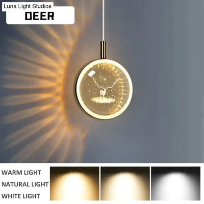 Gold crystal glass LED pendant light with deer silhouette in a round globe by Decorbites on Tampa Home & Garden Store