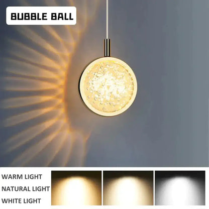 Gold crystal glass LED pendant light by Decorbites, warm amber glow on Tampa Home & Garden Store
