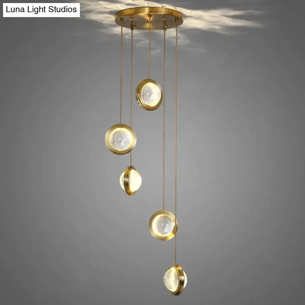 Pendant light with gold crystal glass discs and LED cascade for dining room and kitchen decor on Tampa Home & Garden Store