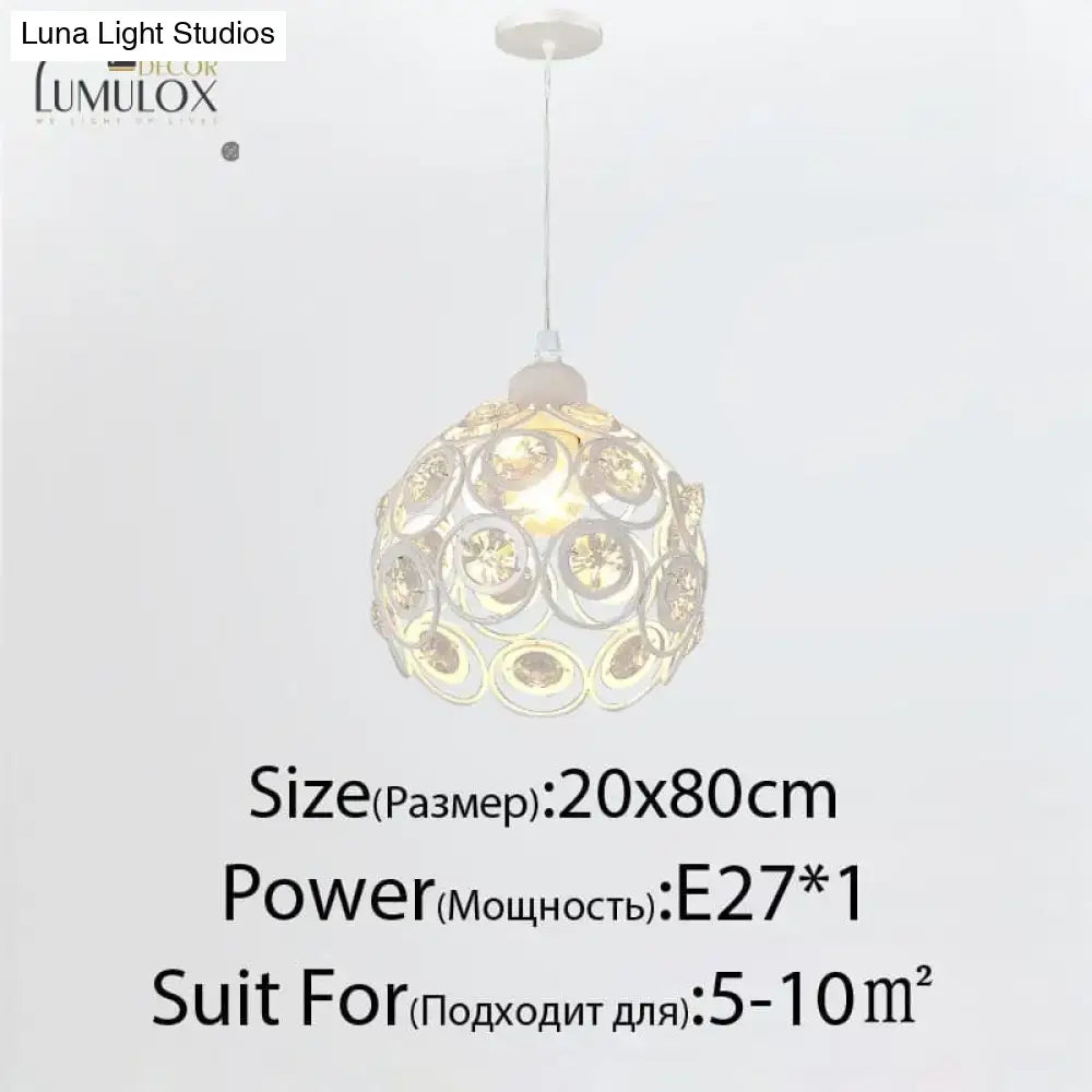 Gold floral crystal nineteen-head chandelier in a spherical metal frame with circular motifs on Tampa Home & Garden Store