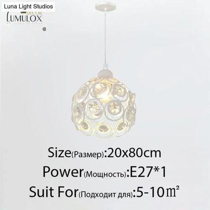 Gold floral crystal nineteen-head chandelier in a spherical metal frame with circular motifs on Tampa Home & Garden Store
