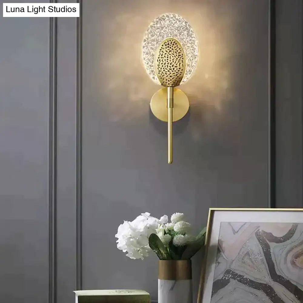 Gold Textured Wall Lamp by Decorbites with ornate oval backplate and slender stem on Tampa Home & Garden Store