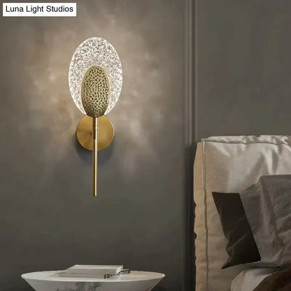 Gold Textured Wall Lamp with crystal halo shade and brass stem on Tampa Home & Garden Store