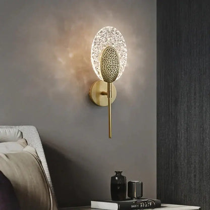 Gold Textured Wall Lamp by Decorbites with brass wall mount and crystal oval shade on Tampa Home & Garden Store