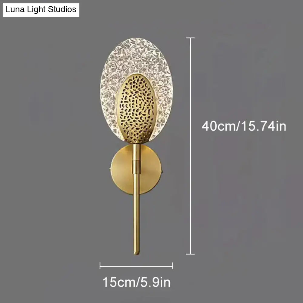 Gold Textured Wall Lamp oval perforated brass centerpiece on brass stem, 40cm tall, 15cm wide on Tampa Home & Garden Store