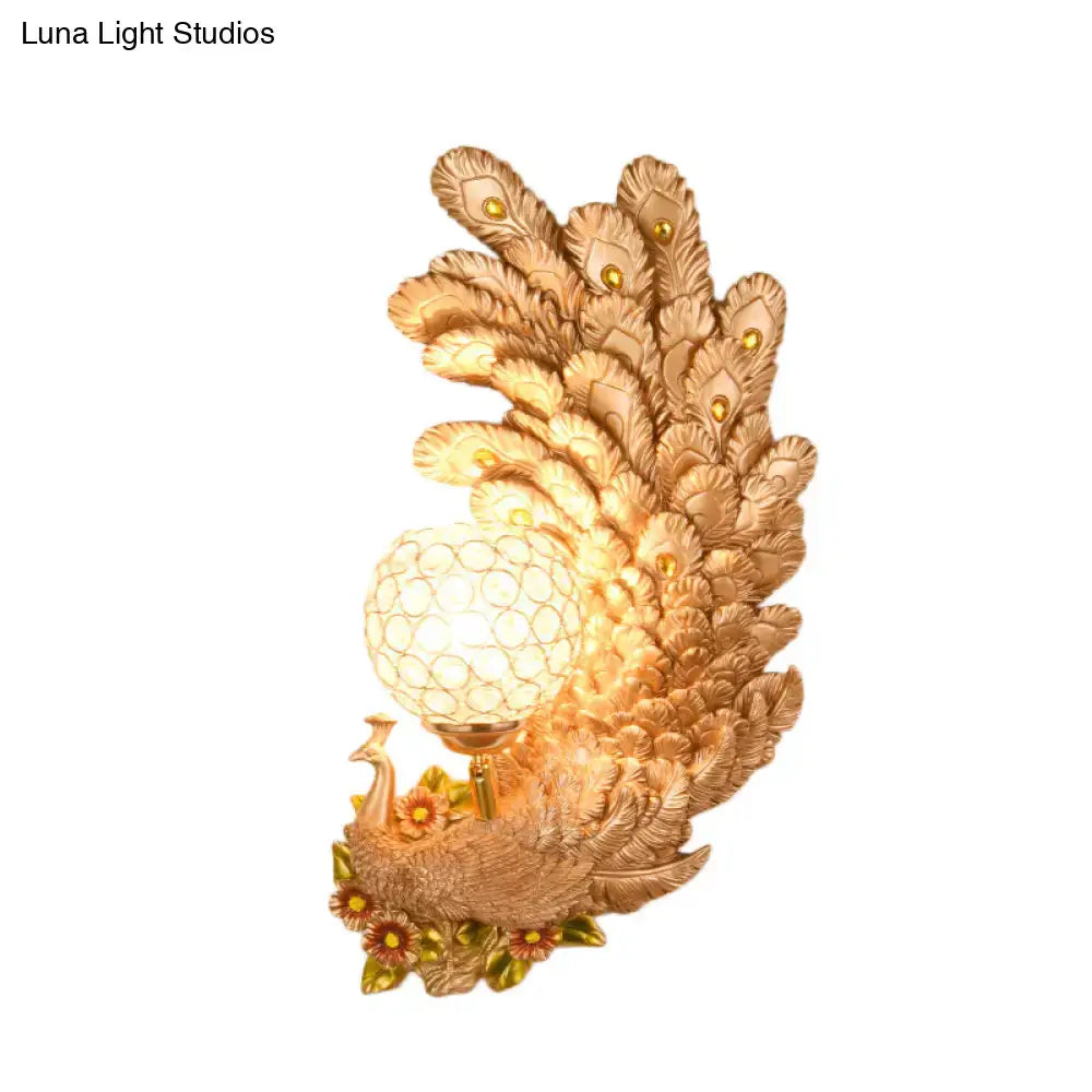Golden peacock wall light with crystal shade, gold feather motif by Decorbites on Tampa Home & Garden Store